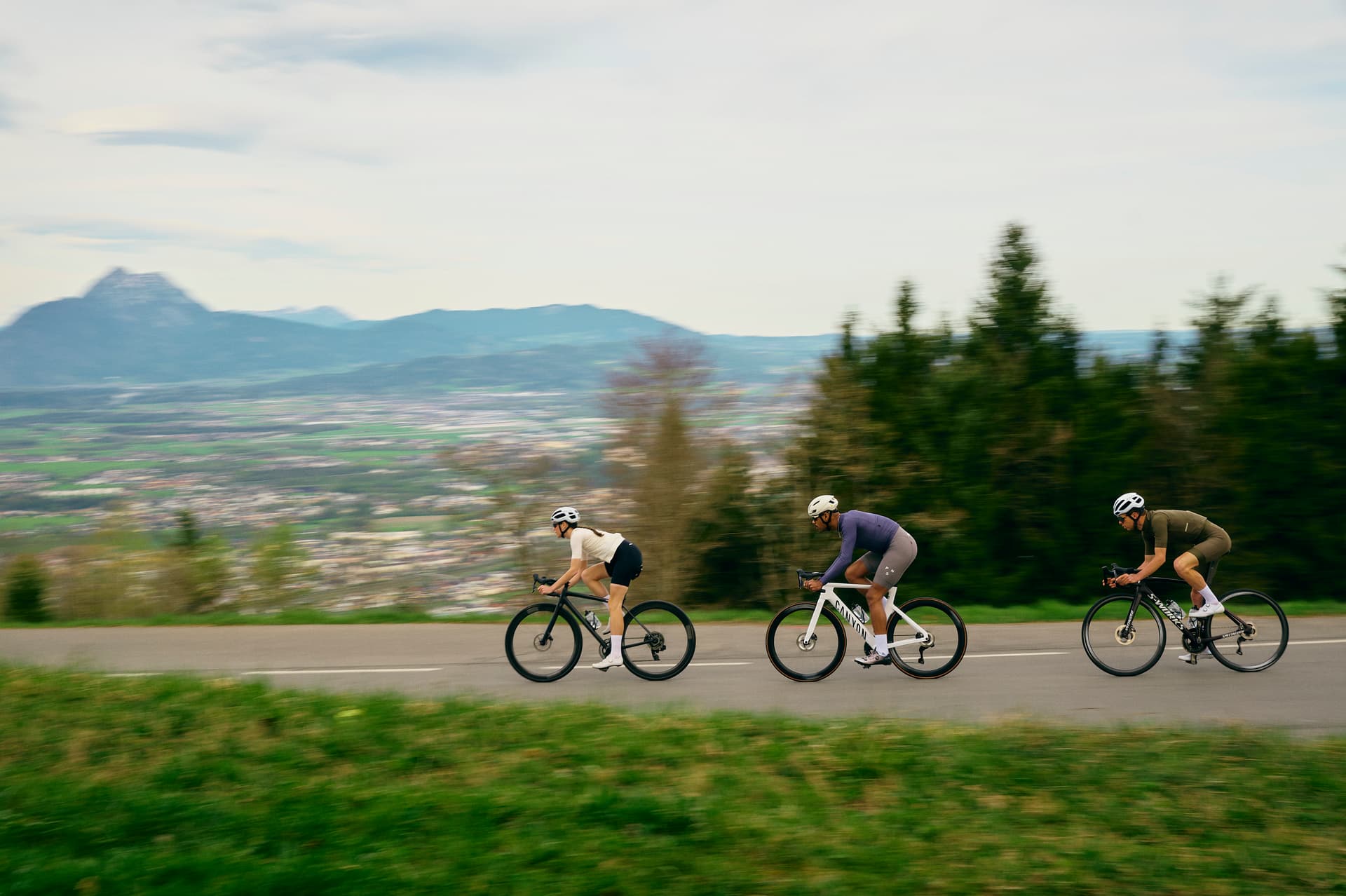 Cyclists riding on a mountain road during a cycling holiday